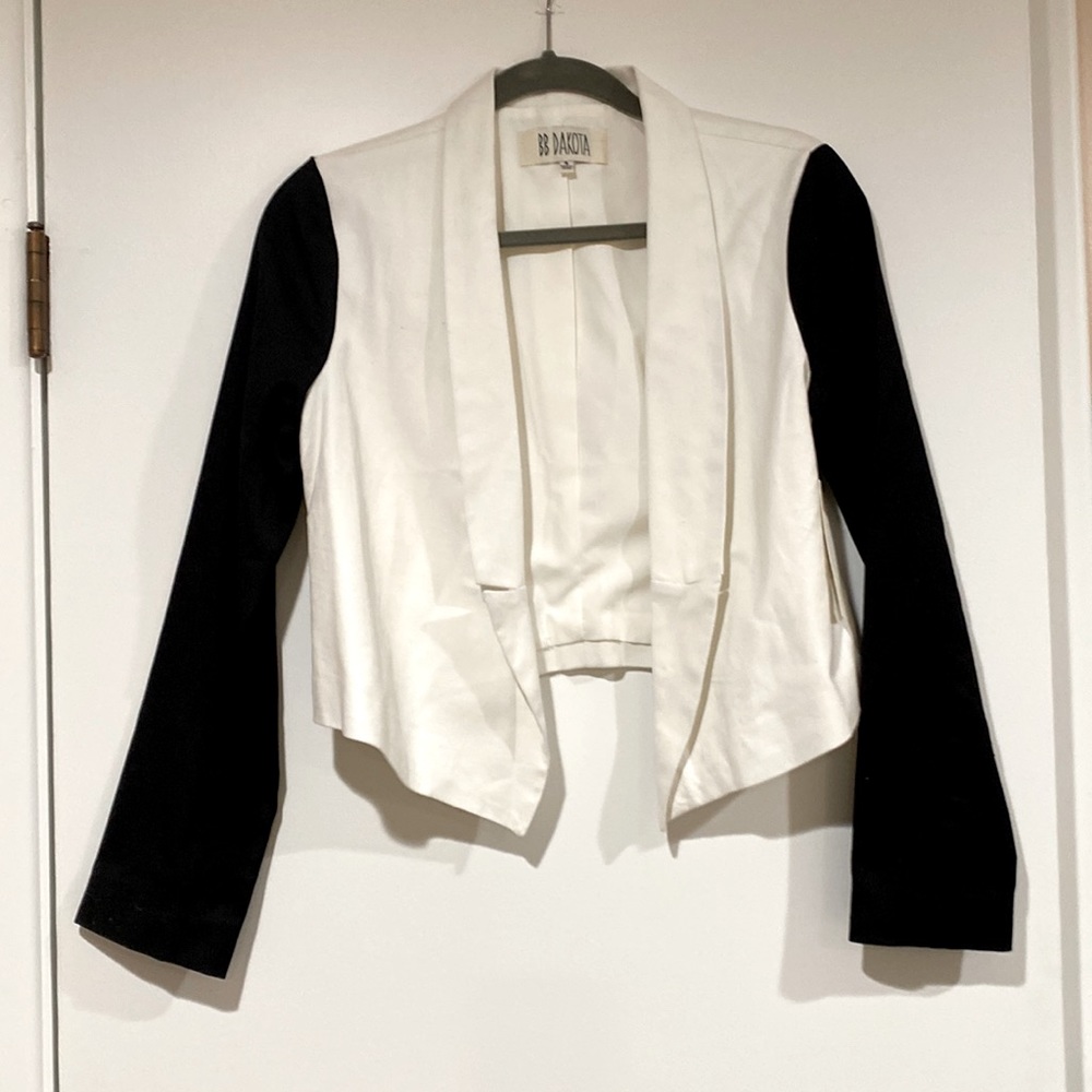 Black and white blazer.